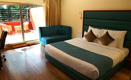 Hotel Cama Veerandah Room with outside sitting area, Spacios rooms best in Mohali, Ranked top in Mohali in TripAdvisor.
